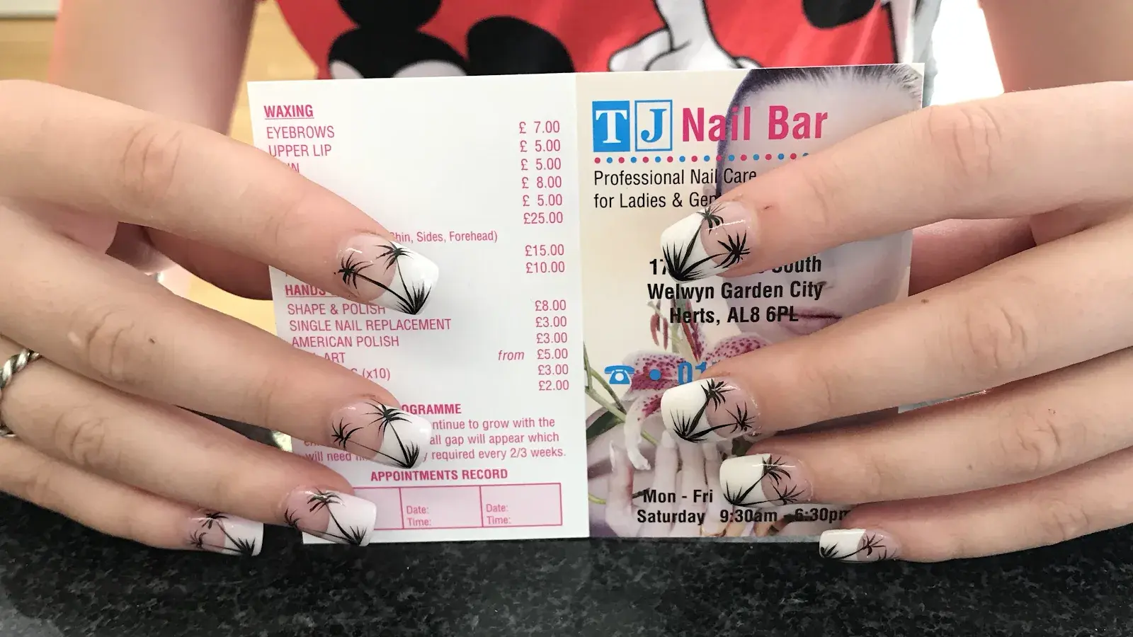 T J Nail Bar